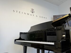 store front steinway and sign